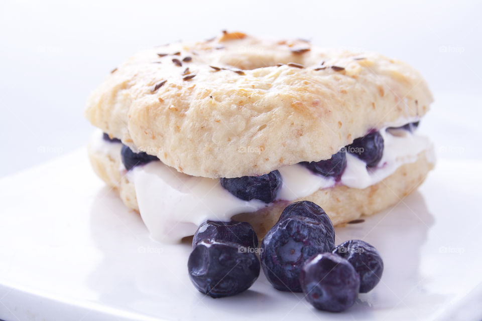 Close-up of blueberry with bagel