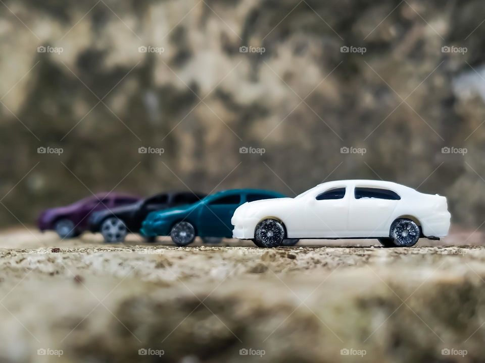 1:100 scale toy car.