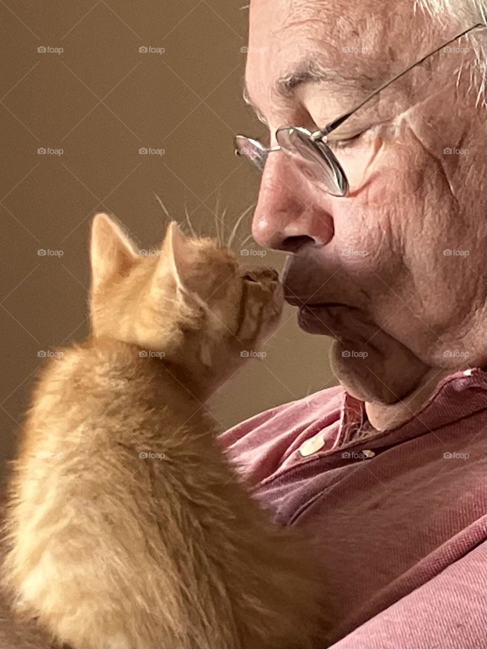 Love between cat and man