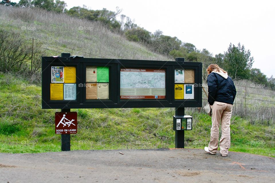 Person with info stand