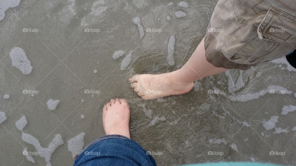 sandy toes. playing in the waves