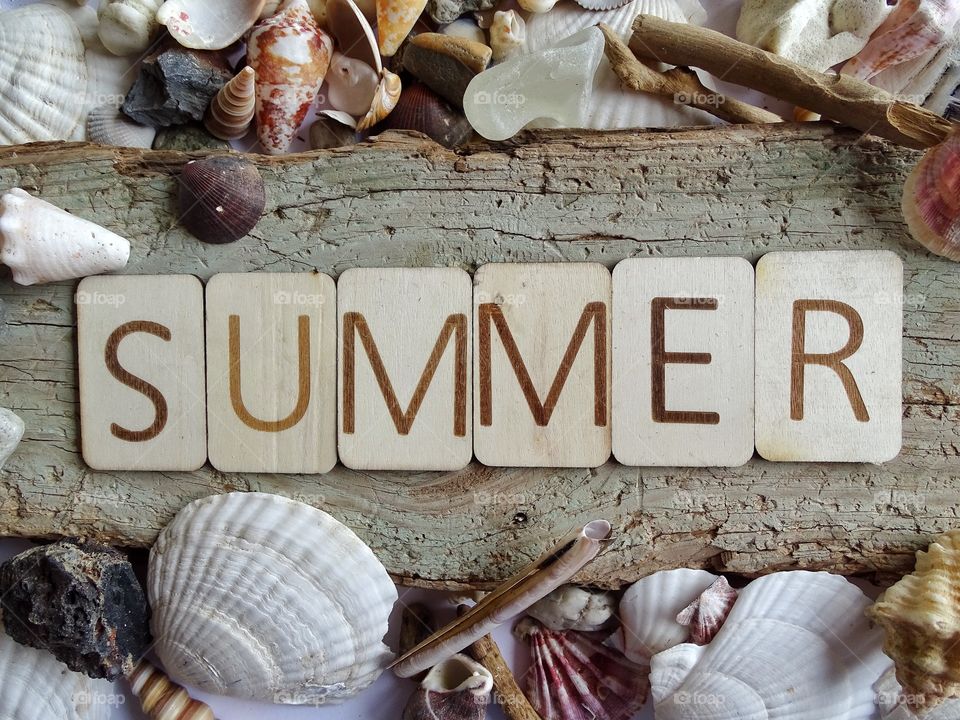 Word Summer with wooden letters