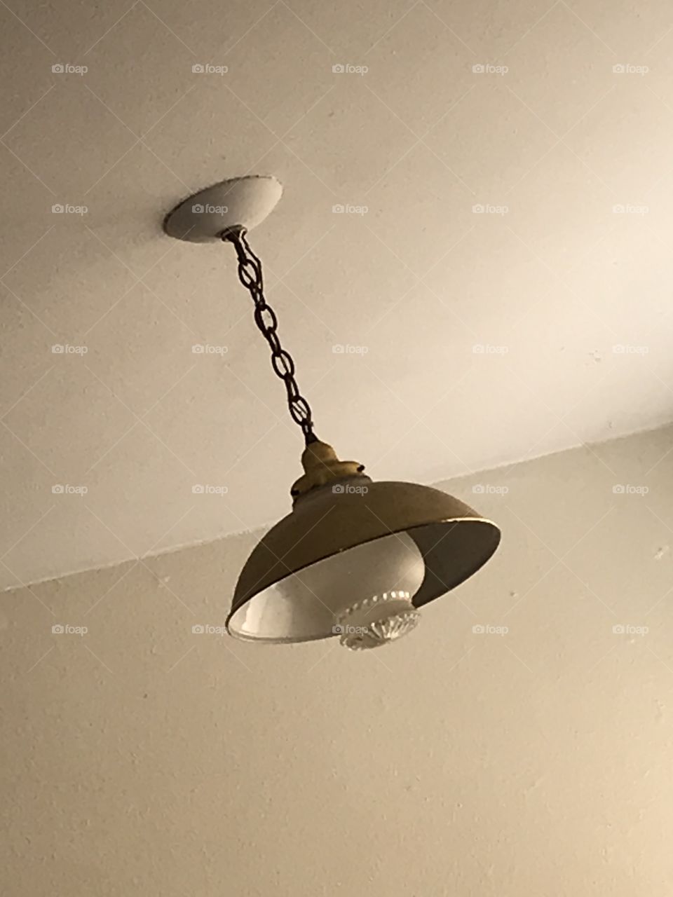 Ceiling light. It is a simple design that uses only one light bulb.