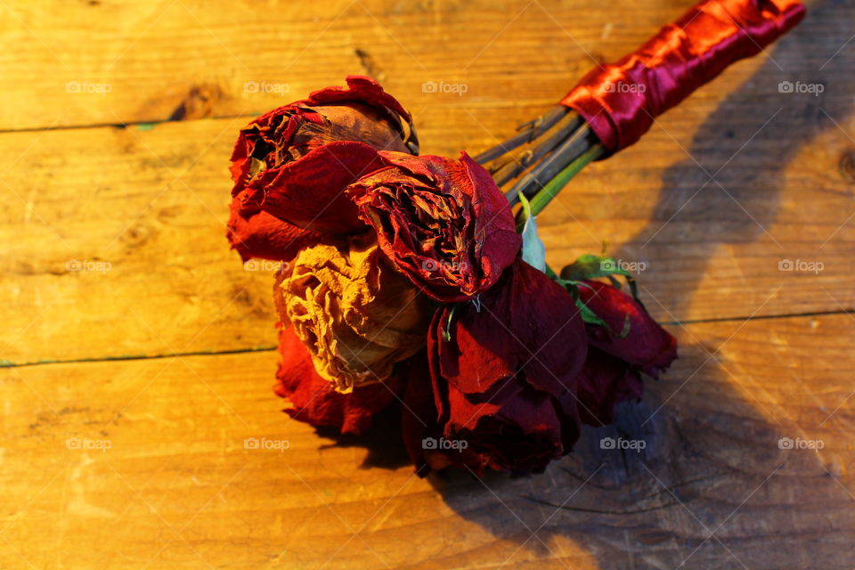 roses on wooden table