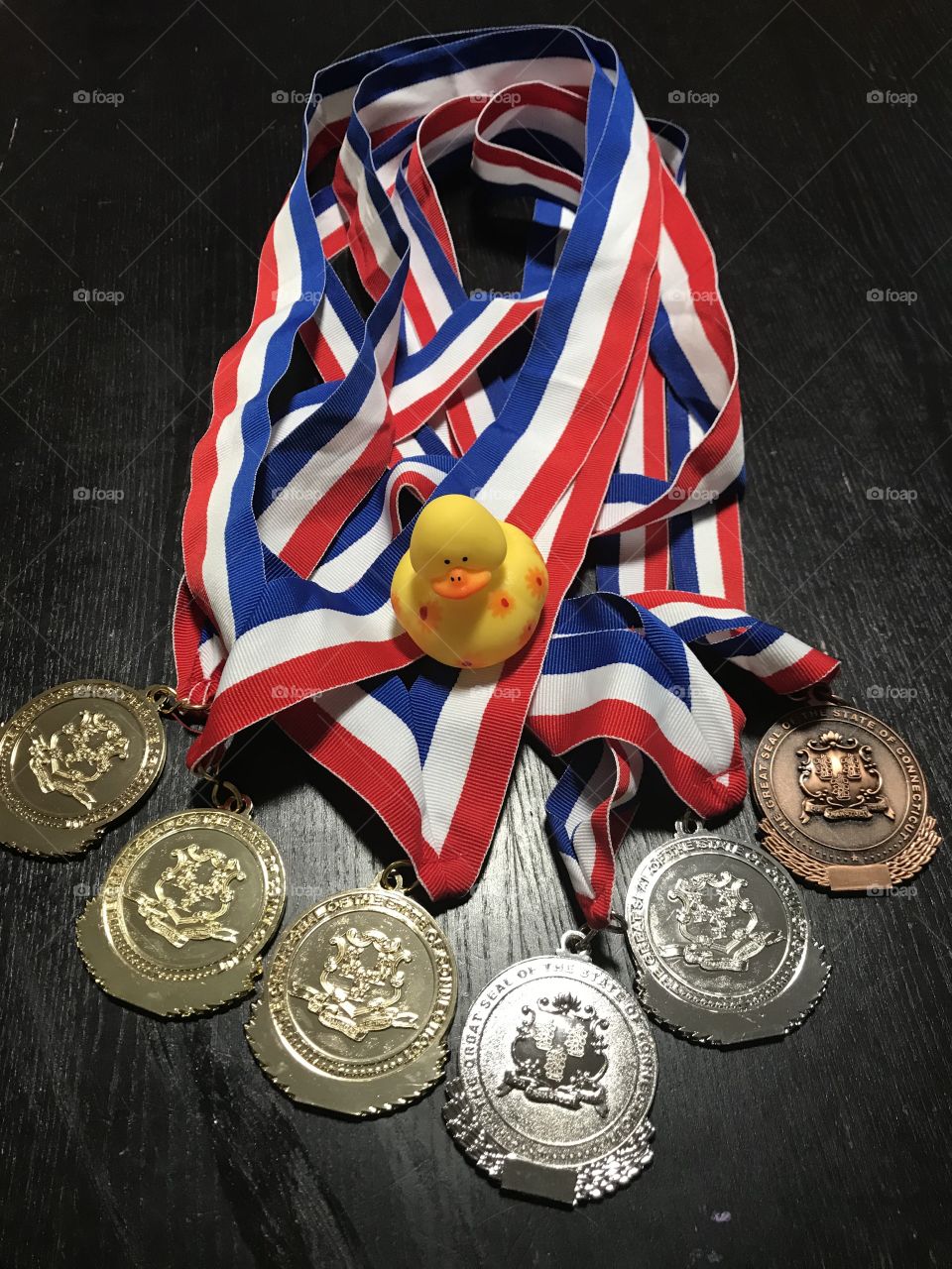 3 gold, 2 silver, 1 bronze... and a duck. Connecticut Master’s Games awards for swimming. 