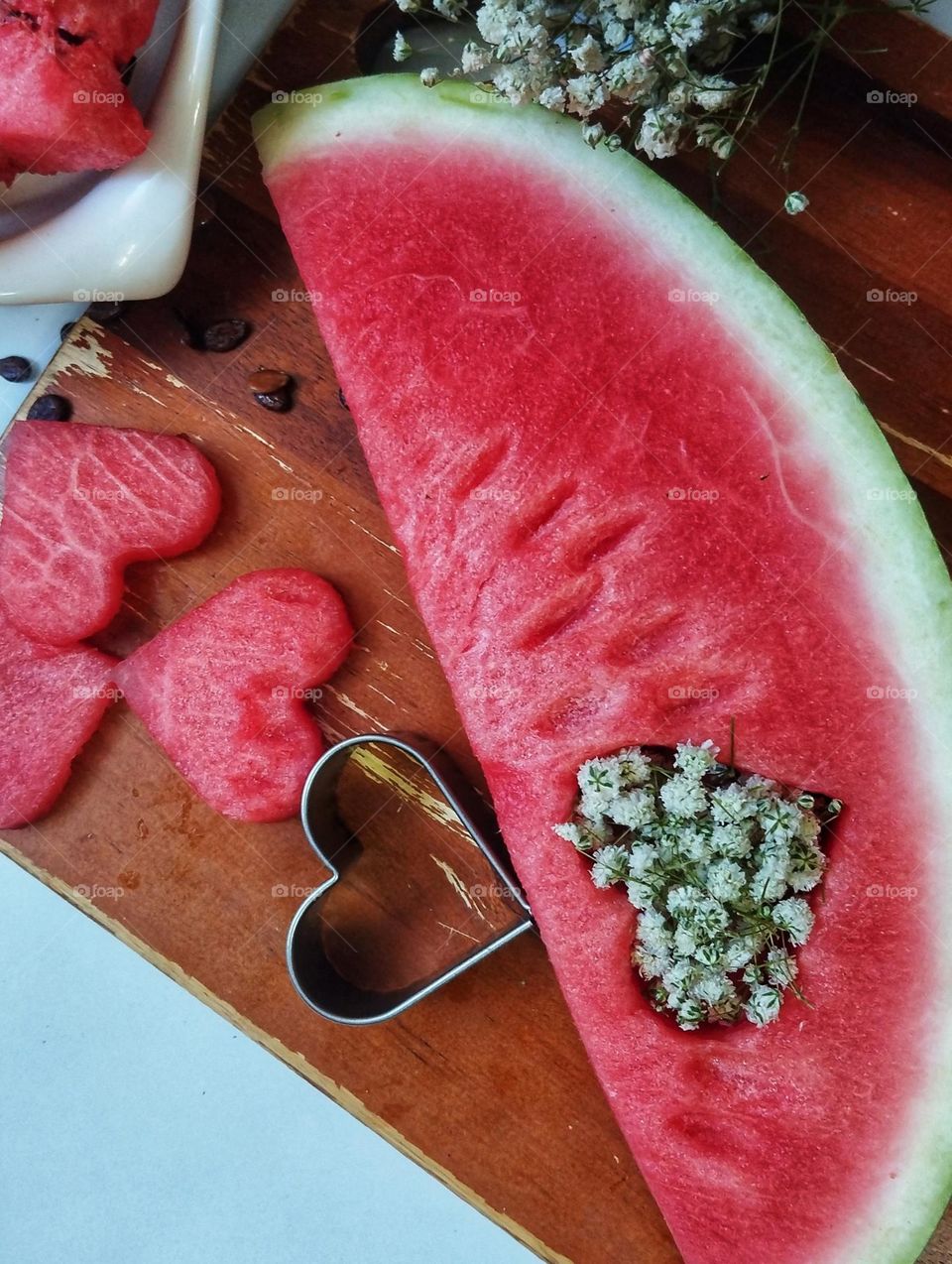 A slice of juicy watermelon with pleasant  colour gives the taste of love.