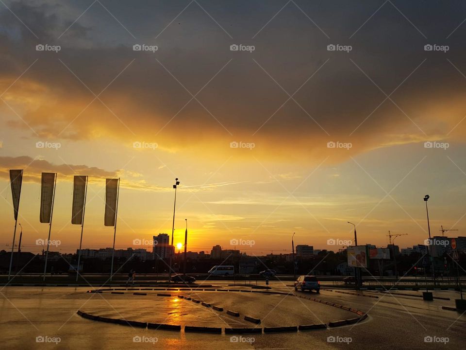 Watch as the sky dances from day to night, with clouds painting the perfect transition. From golden hour glow to deep hues of twilight. These stunning shots capture the magic of light and shadow as they shift across the sky.