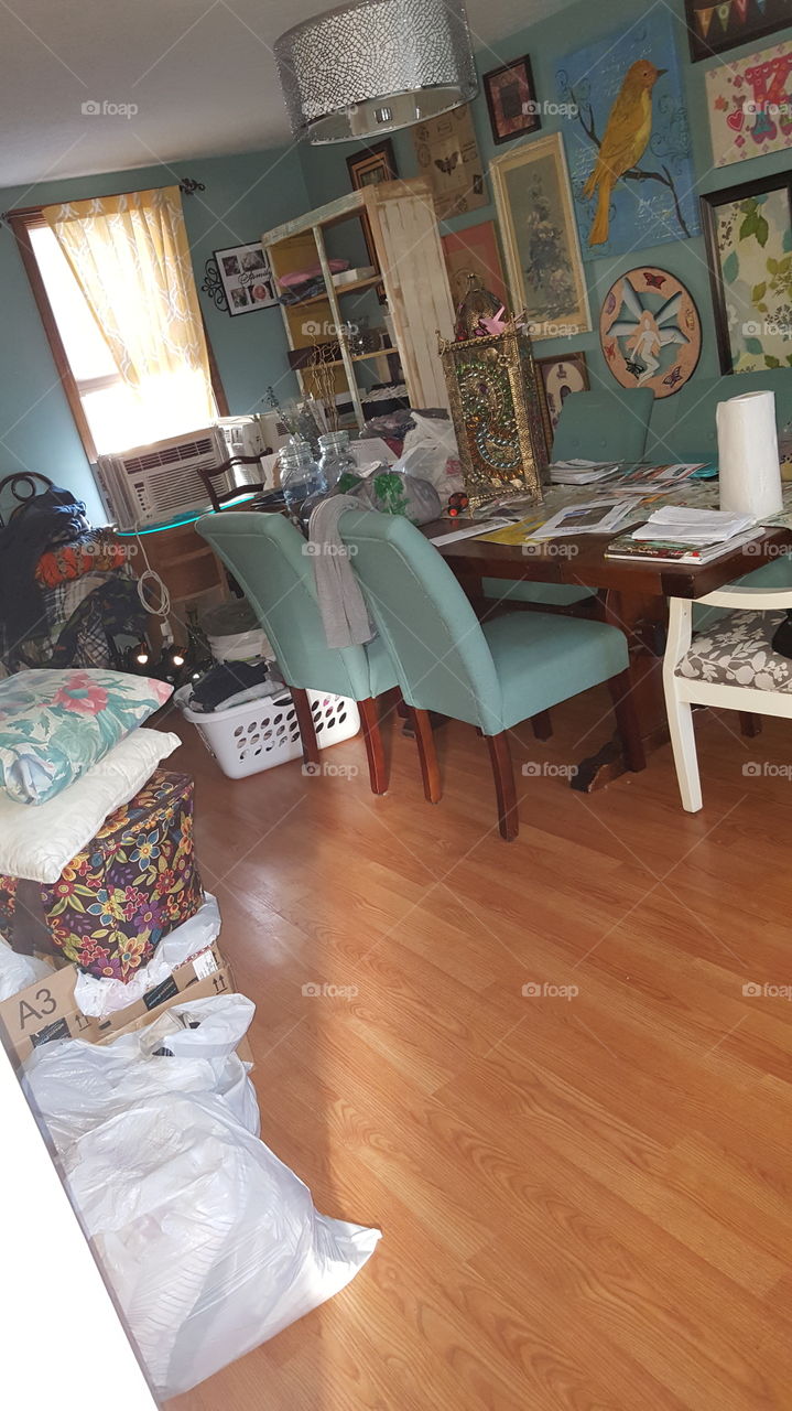 the dining room has become the messy catch all area