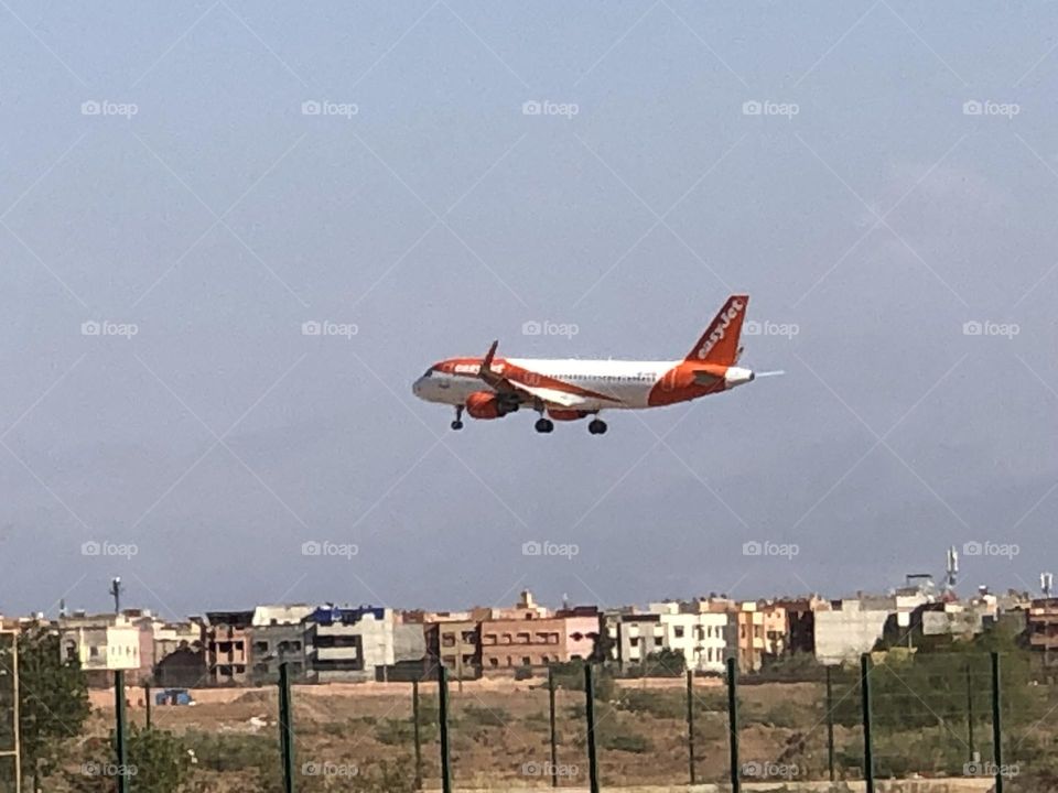 beautiful aircraft flying cross the blue sky