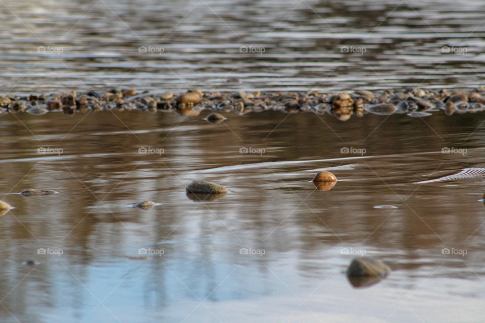 Pebbles in a river