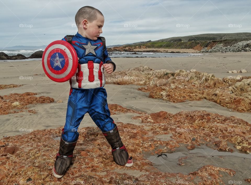 Boy In Superhero Costume
