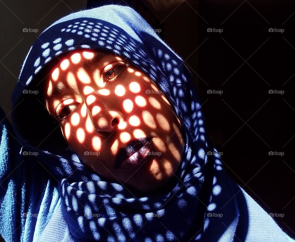 portrait woman , wearing blue clothes , beautiful face and color