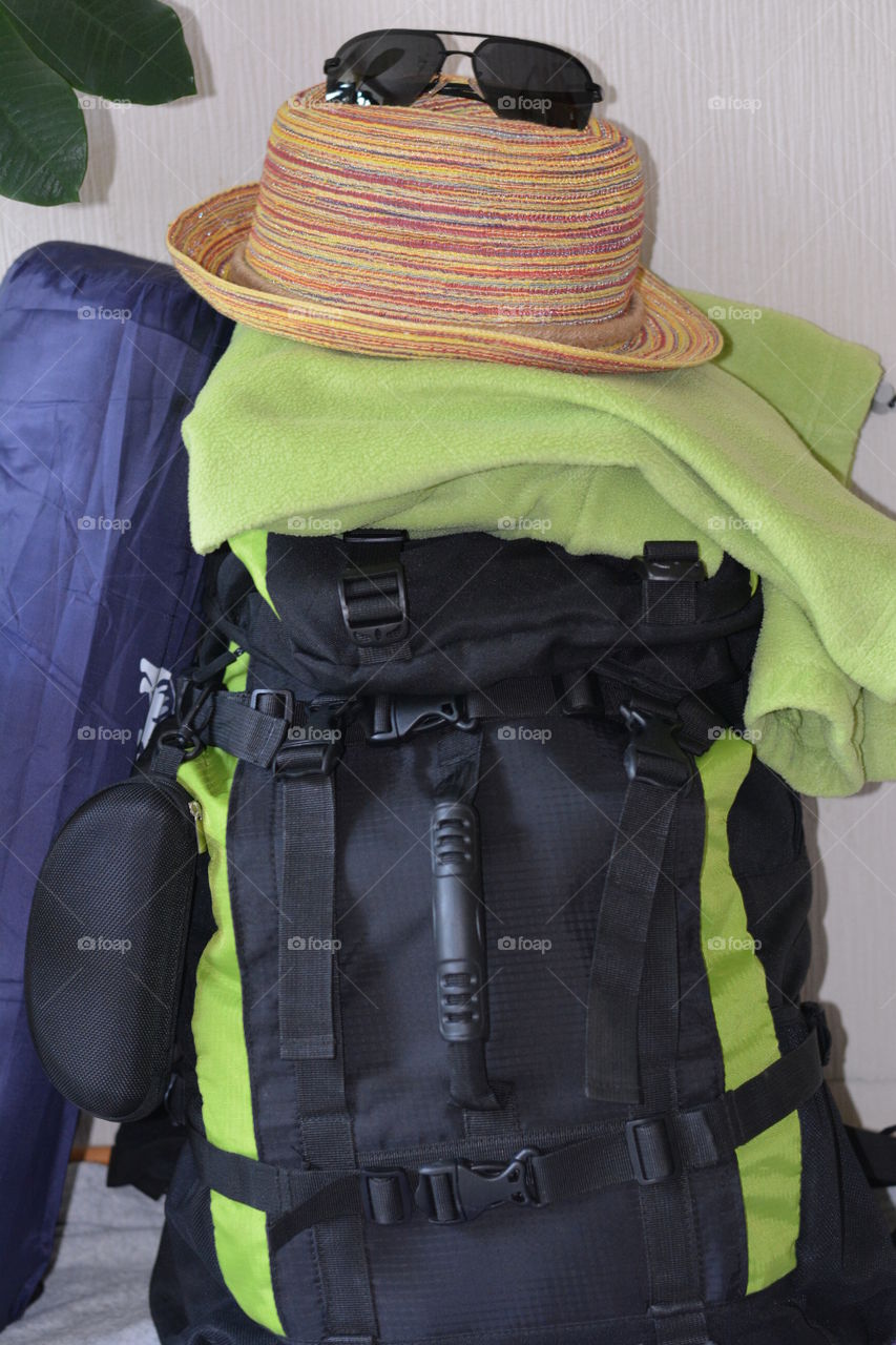 summer travel backpack and objects