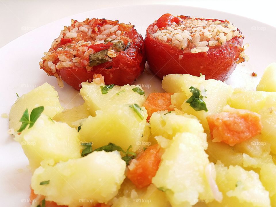 Stuffed tomatoes and potatoes