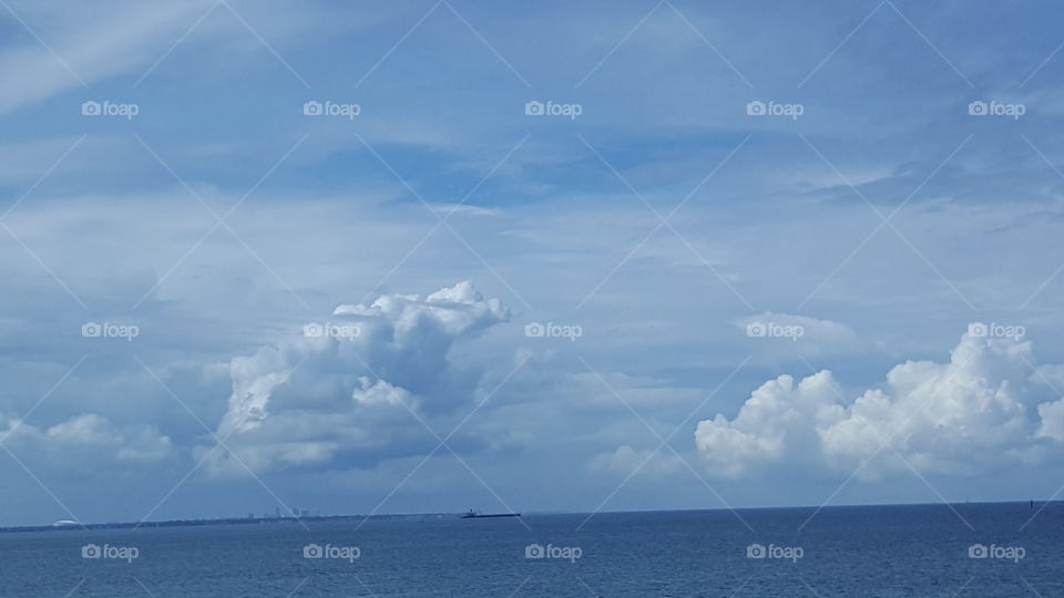 Clouds rest over the waters of Tampa Bay.