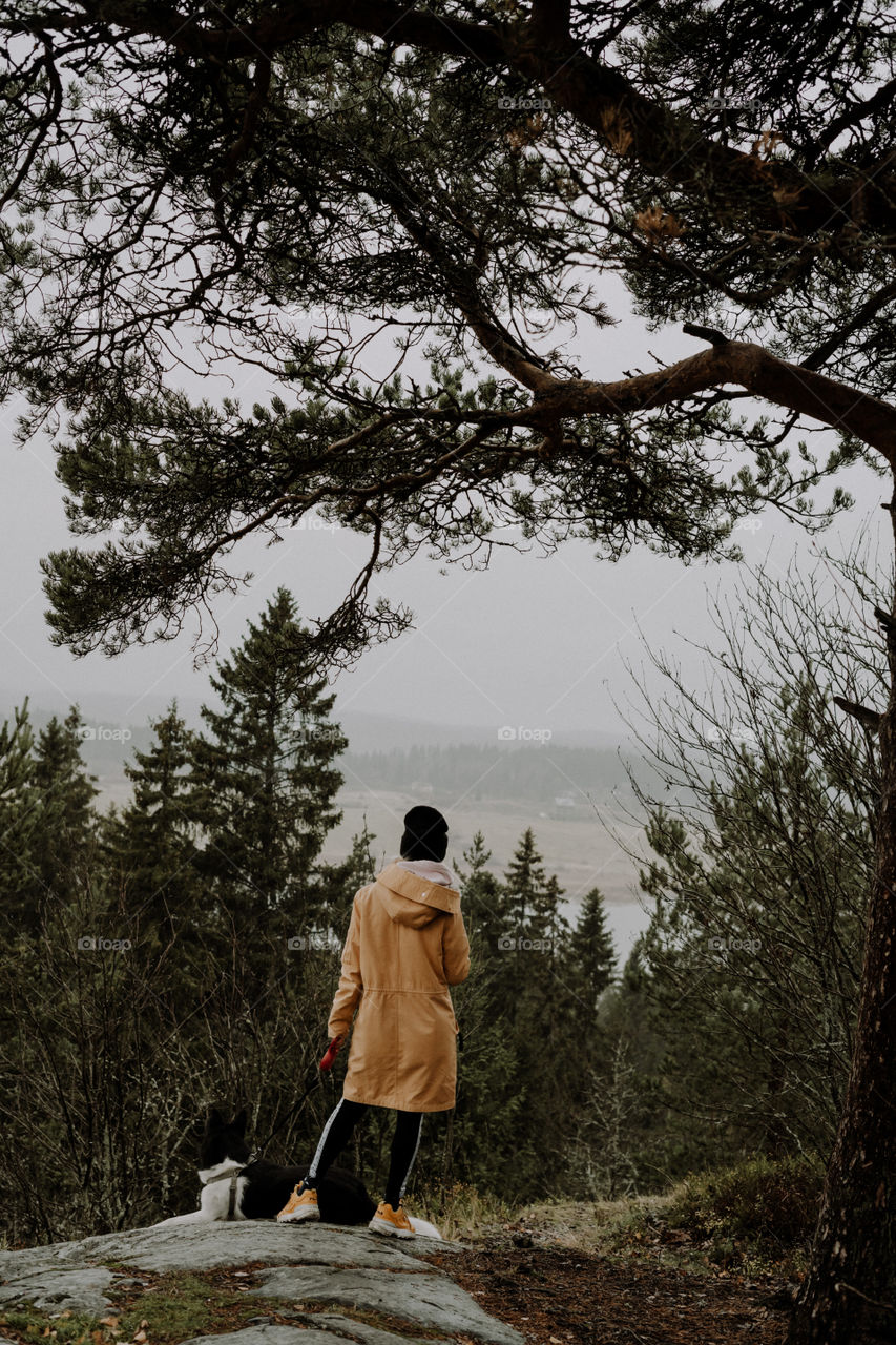 nature in russia / woman with a dog in fall
