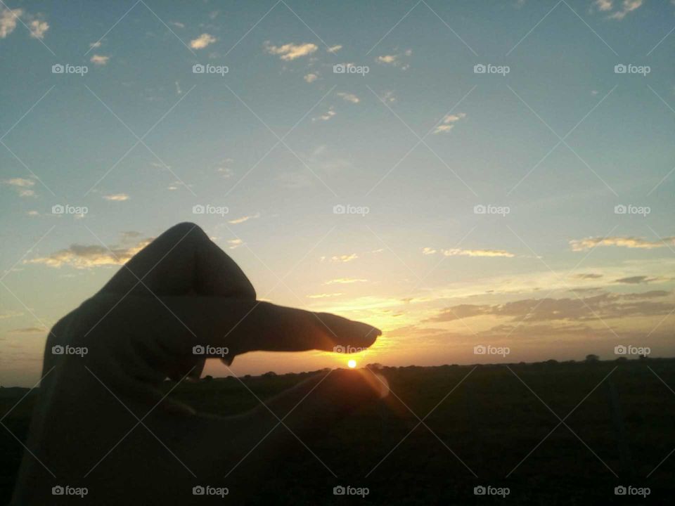 the sun on  my  fingers, the best sunsets on  my  cute and darlinh plain