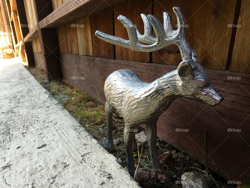 It's a deer. A silver Stag!