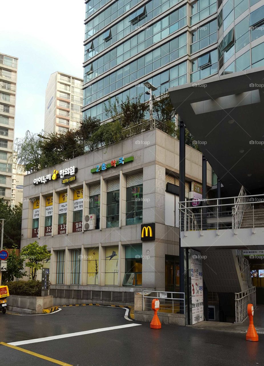 cityscape in Seoul South Korea. Building housing McDonalds restaurant.