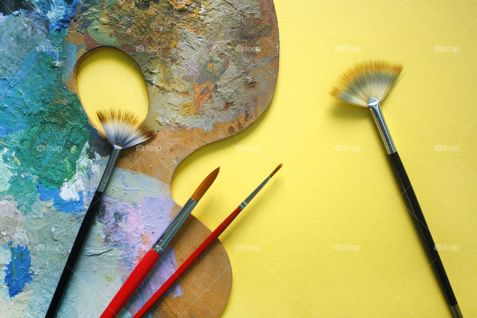 Artistic background with paintbrushes and palette 2