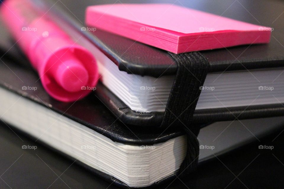 Pink highlighter and notepad