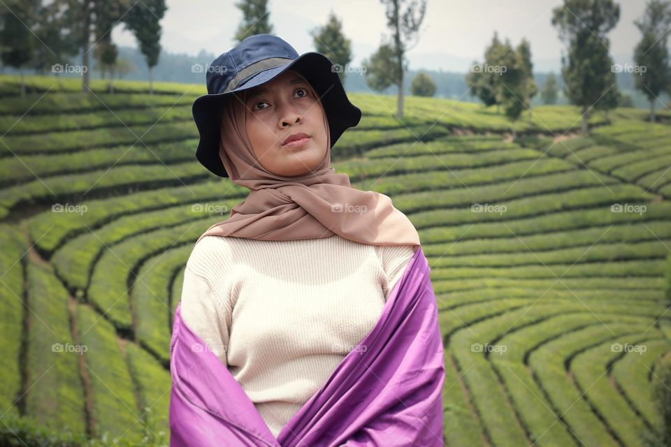 woman standing in field