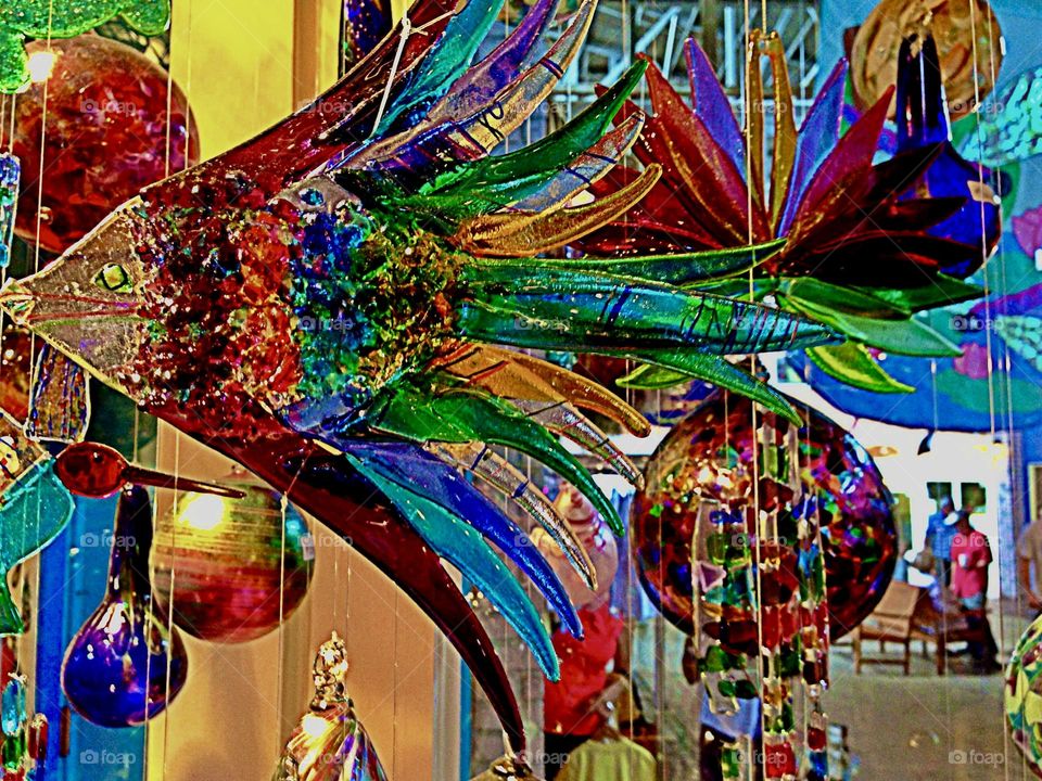 Vivid colored glass mobiles.