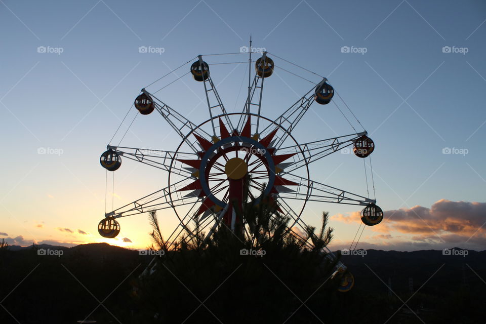 Ferris wheel at sunset. 