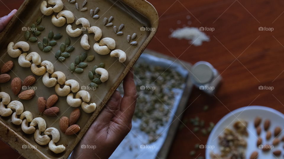 Top down view of nuts and seeds ready for roasting