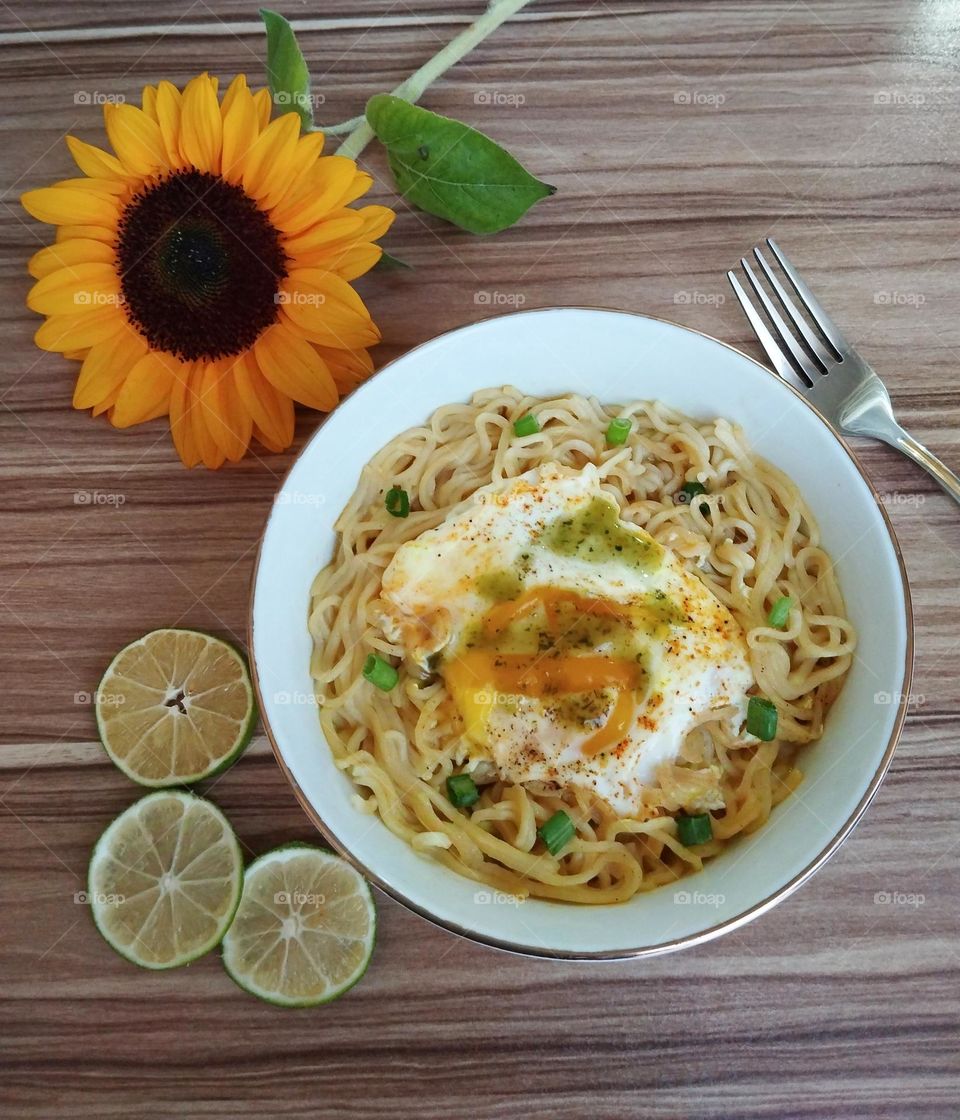 We celebrate autumn next to cheerful sunflowers with healthy food . 
Hoping for the best for everyone