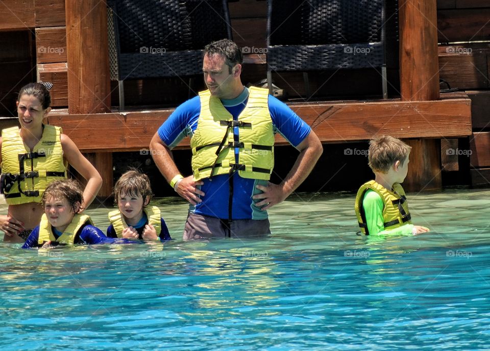 Dad Teaching Boys To Swim
