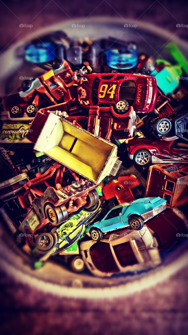 Bucket of matchbox cars. 3d look of a bunch of  matchbox cars