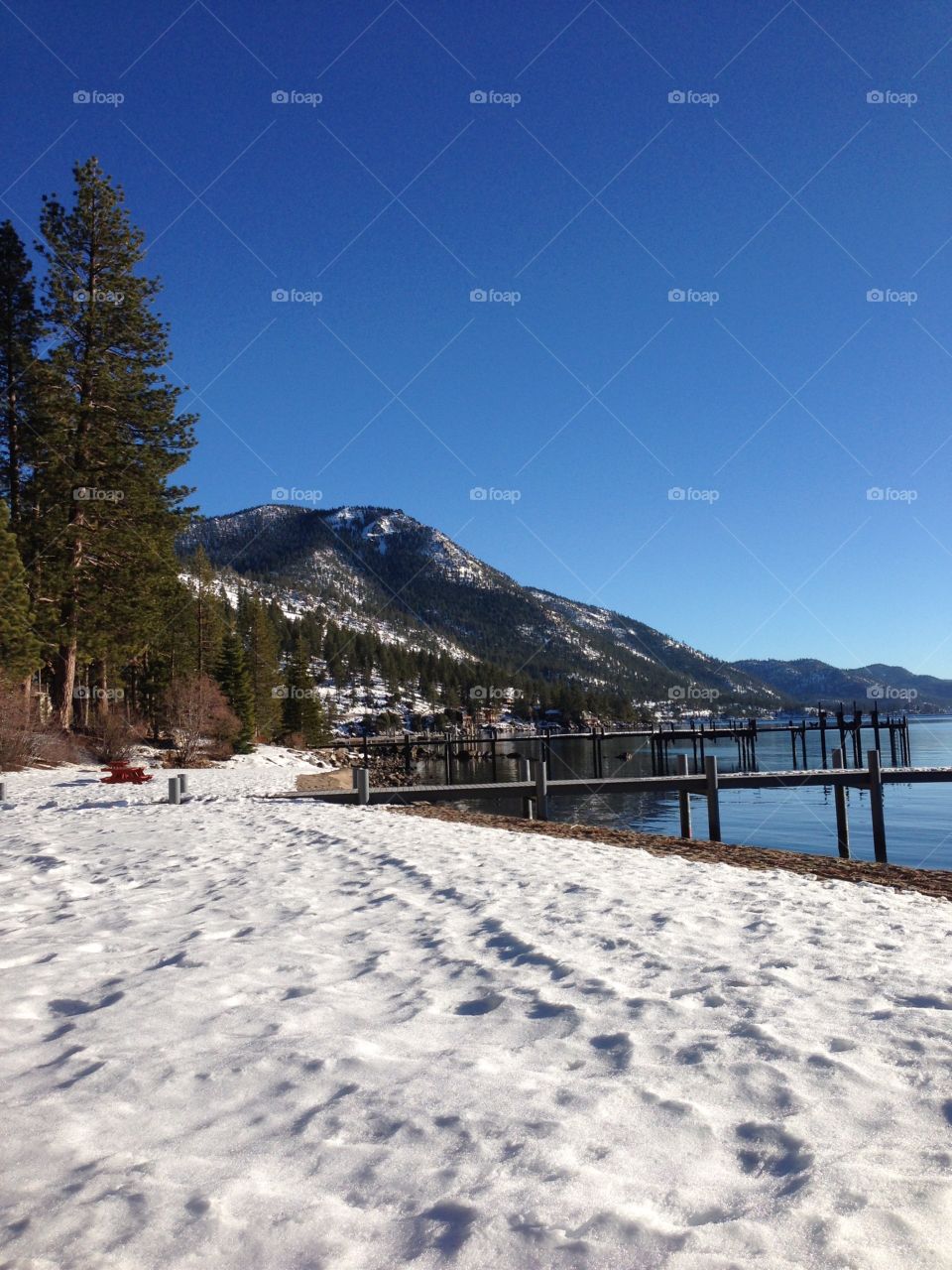 Warm winter day at the beach in Lake Tahoe.