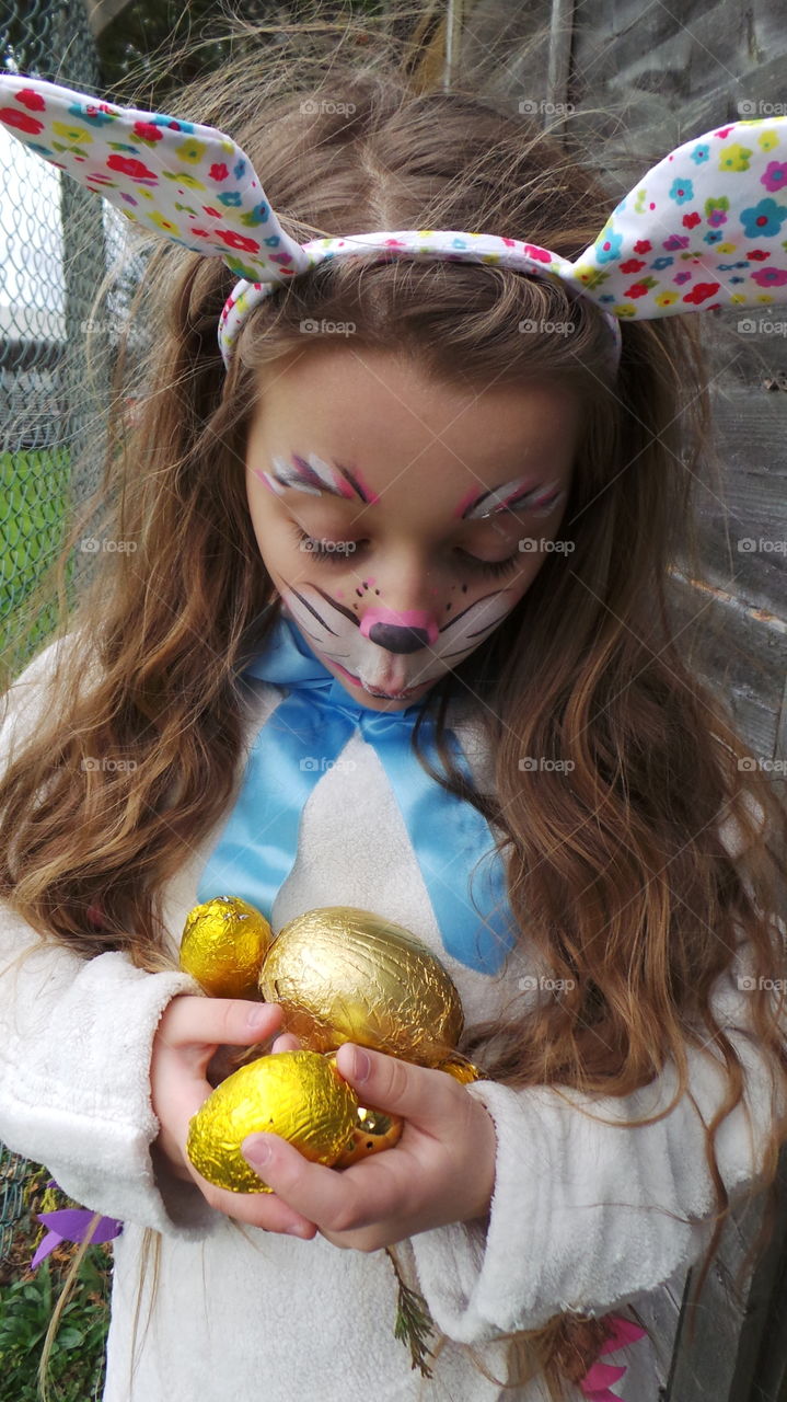 excited easter bunny child In costume