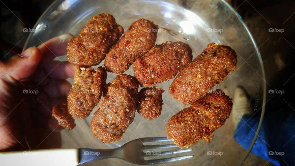 Porção salgados, quibes fritos.