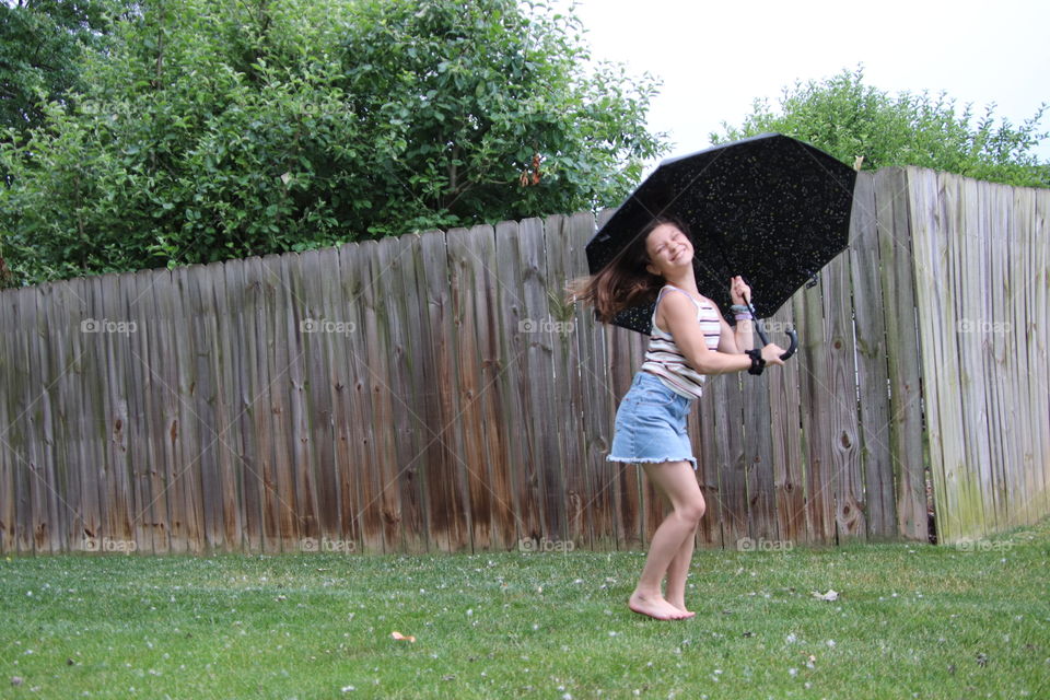 Girl with Totes umbrella