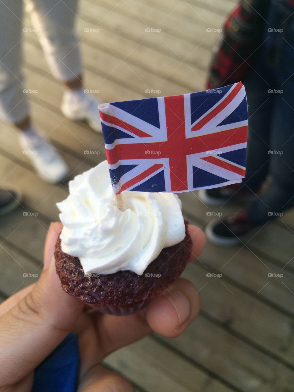 Union Jack Mini Cupcake. Enjoying a red velvet mini cupcake at the Victoria Day celebration. 