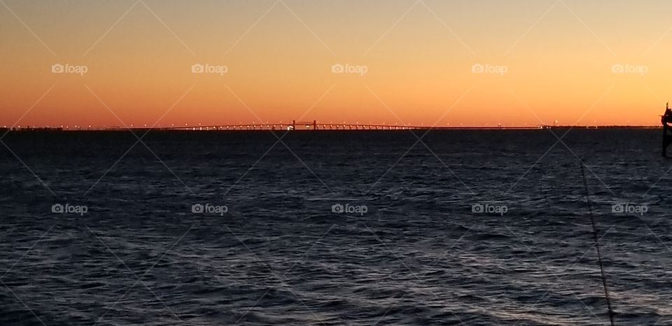 Sunset over Galveston Causeway Bridge over Galveston Bay