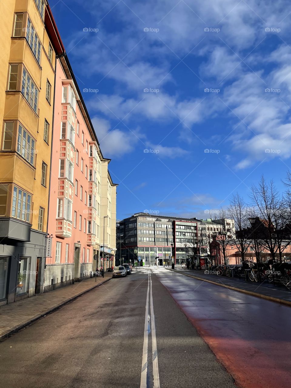  Colorful city street with blue sky