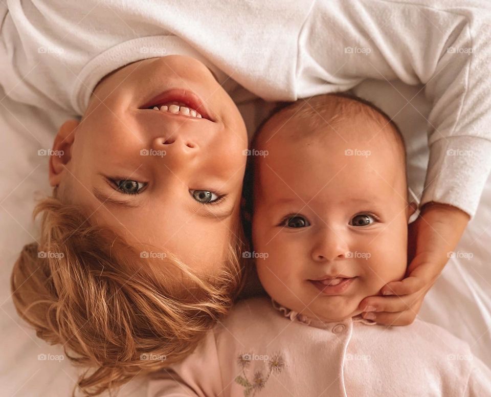 Smiling two sweet kids 