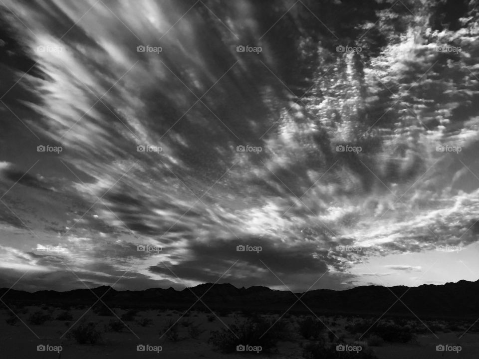 Black and white version of a cloud swept western sunrise. 