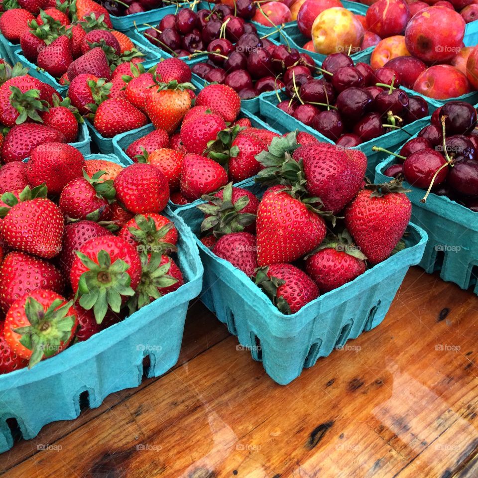 Fruit Stand. Strawberries, cherries and sugar plums