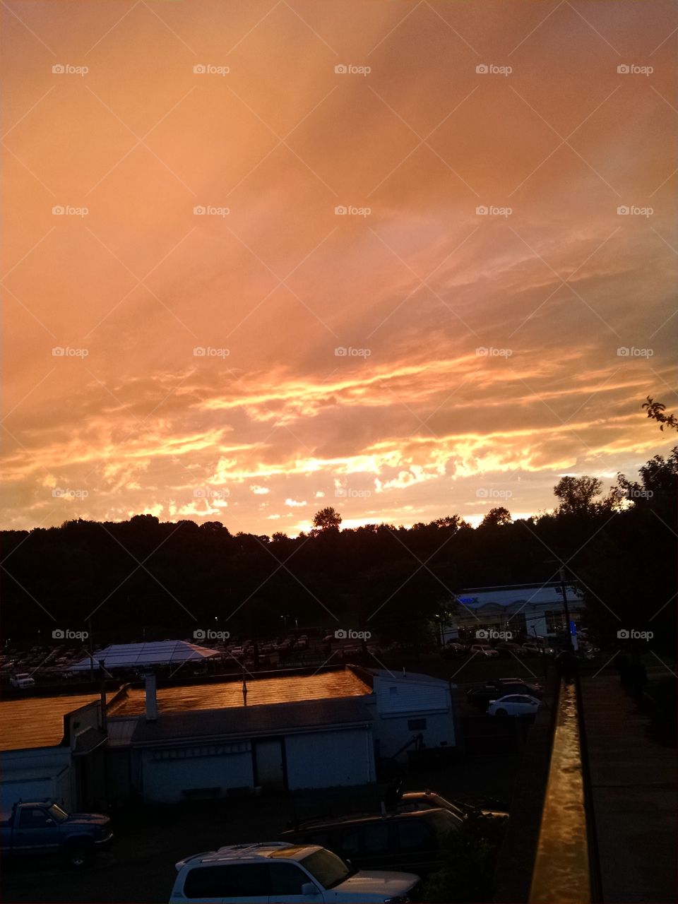 Golden SKY!!!. I took this pic on July, 19,2015 in Newton New Jersey after a huge rain storm. this pic was not altered in any way.