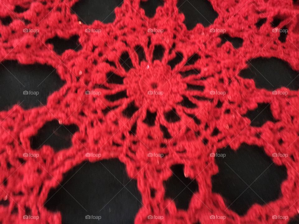 Crocheted medallion in red 