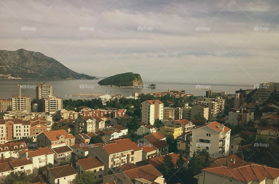 city, island, mountains and sea