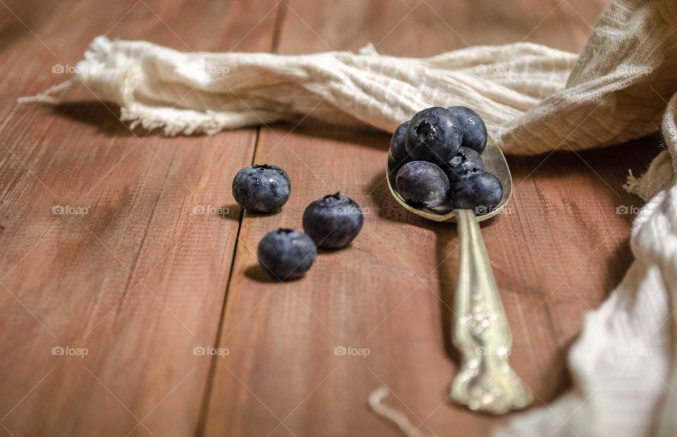 Close-up of blueberries in spoon