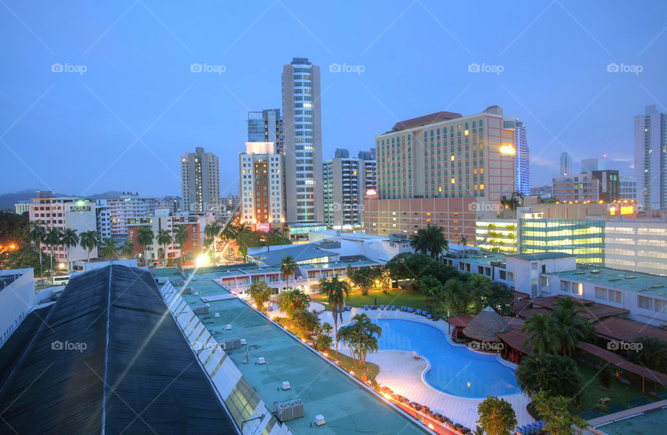 panama close cityscape top view with blue pool sorrounded by buildings