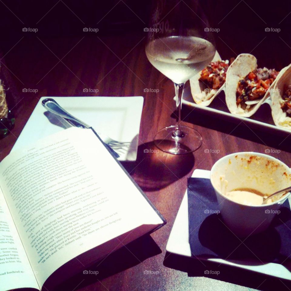 With a job as active as mine, my favorite way to wind down is a glass of wine, good food, and a good book. My own little escape from reality for a bit.