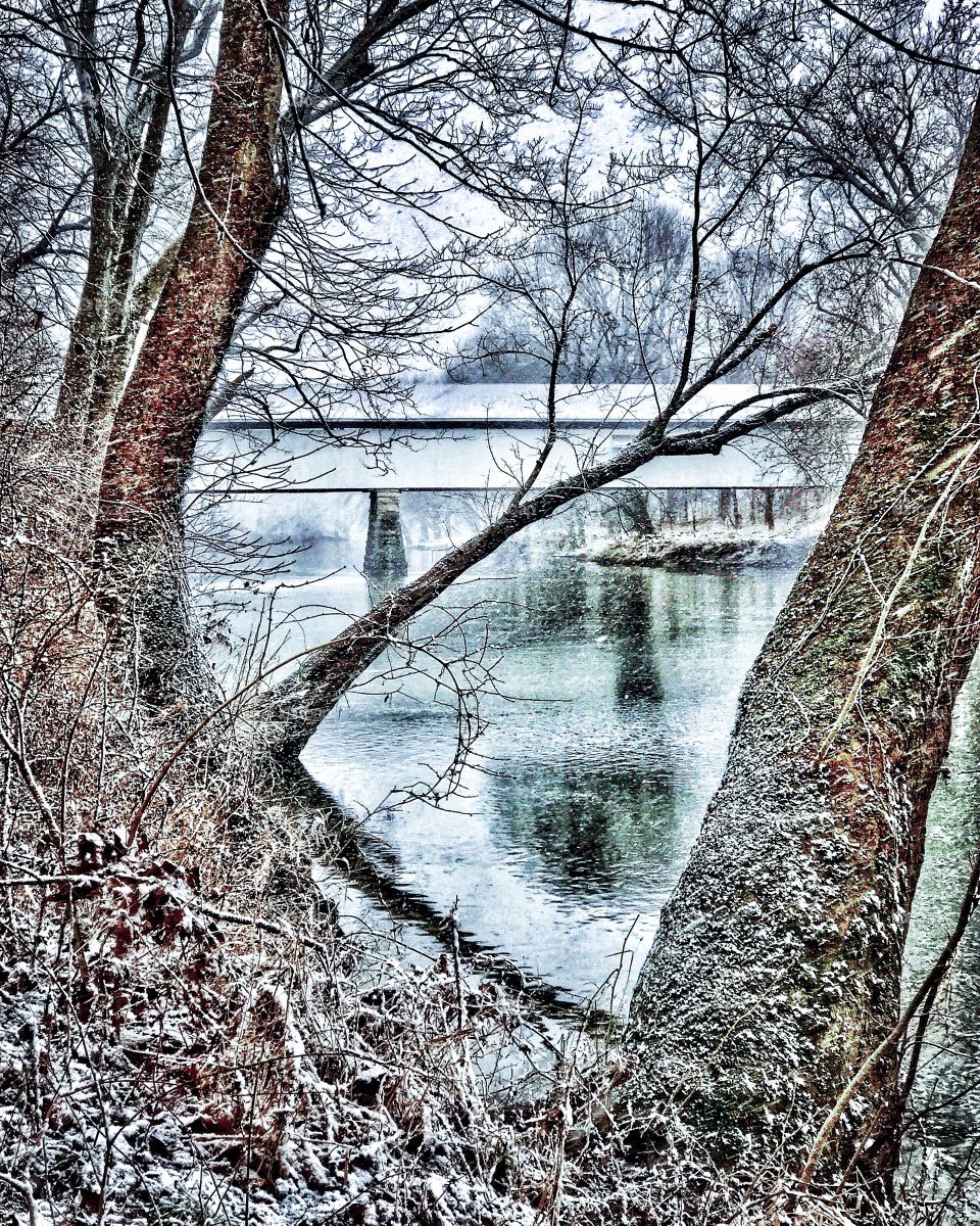 Beautiful winter by the covered bridge 
