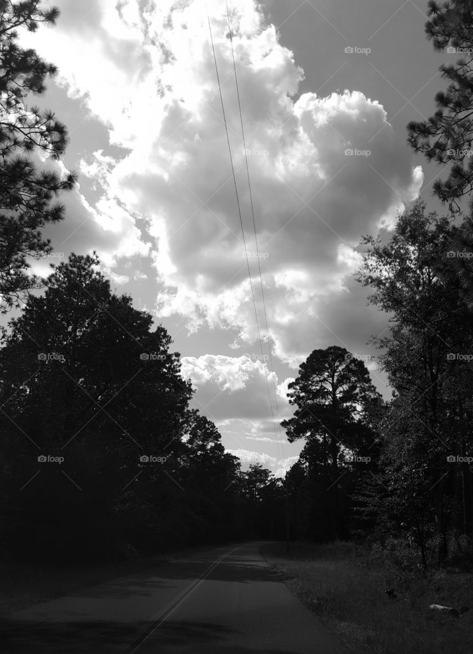 back road clouds grayscale